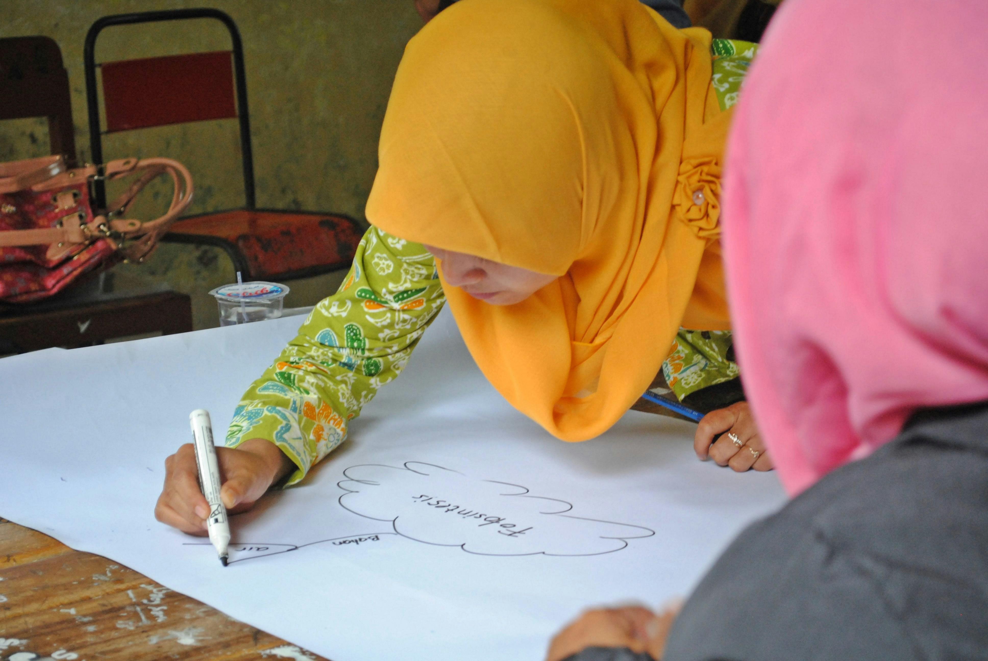 Siswa belajar dengan laptop